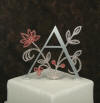 charmed font A monogram cake topper with crystals on flower