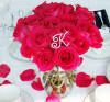 mini crystal monogram letter as part of this table centerpiece - a decorative accessory