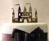 wmi castle wedding cake topper shown here in gold mirror acrylic