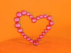 3" heart with out tendrils in fuchsia crystals