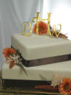 gold mirror acrylic 3 letter monogram wedding cake topper