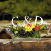 You can use monogram initials in flower centerpieces, too.