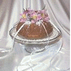 A bundt cake with flowers in the center for the bridesmaid charm cake - also called cake charms or cake pulls.