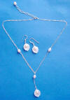 2-piece mother-of-pearl and pearl sterling silver drop-style calla lily necklace and earrings jewelry set.