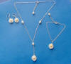 Sterling silver mother-of-pearl and freshwater pearl bridal necklace, bracelet and earrings jewelry set.