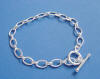 sterling silver oval link and toggle clasp charm bracelet