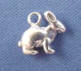 sterling silver rabbit wedding cake charms for your bridesmaid charm cake also called a ribbon pull