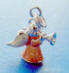 sterling silver 3-d angel with trumpet has on marble pink gown and white wings
