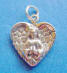 sterling silver praying angel with wings forming a heart charm