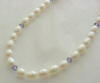 Flowergirl necklace with freshwater pearls and Swarovski Tanzanite crystals