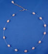 nylon-coated stainless steel wire with peach freshwater pearls necklace