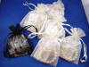 each jewelry set is gift wrapped in matching organza pouches