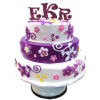 acrylic monogram cake topper shown in dazzle font in fizzy grape color