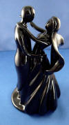 black porcelain bride and groom wedding cake topper