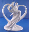 white porcelain bride and groom wedding cake topper