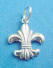 sterling silver fleur-de-leis charm