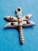 sterling silver dragonfly charm with genuine amethyst stone accents in wings