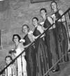 Jen and her bridesmaids on the stairs at Castle McCulloch.