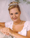 Mel is wearing pearl and crystal twist jewelry on her wedding day - necklace, bracelet and earrings