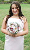 Here is a junior bridesmaid in her organza and pearl necklace.