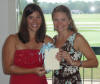 The bride, Jennifer, with her matron of honor, Jenny - her sister in law, holding her bride's bible with the sterling silver cake charms on blue ribbons.