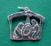 sterling silver handmade Christmas nativity charm - manger scene is on both sides of this charm