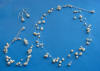 This 3-piece bride's wedding jewelry set has freshwater pearls and crystals