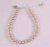 pink pearl bracelet made from baby christening bracelet