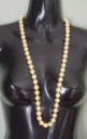 opera length golden shell pearl necklace