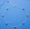 sterling silver station necklace with black pearls ON the chain